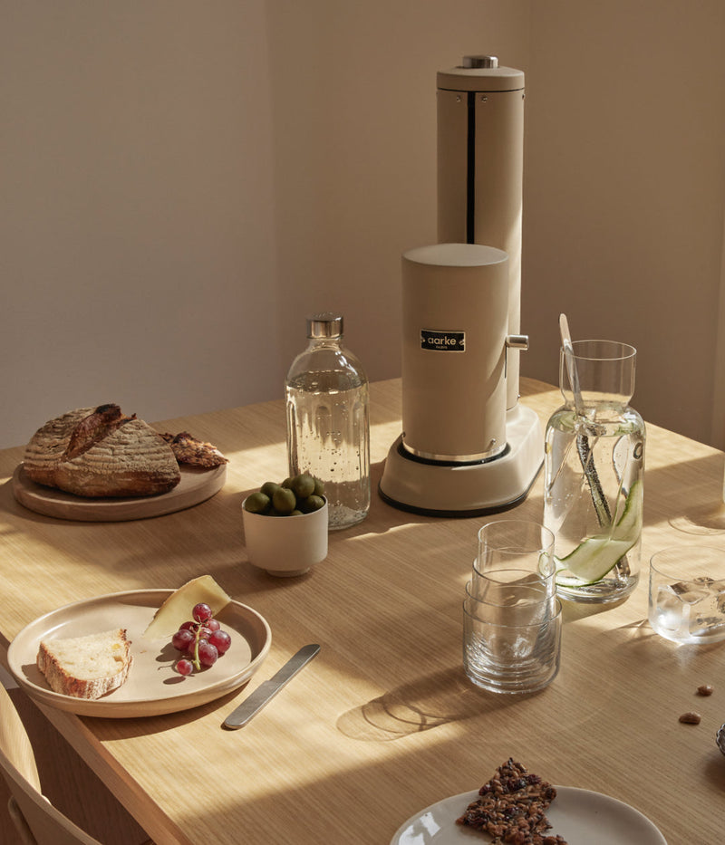 Aarke Carbonator Pro - Sand on the dining table